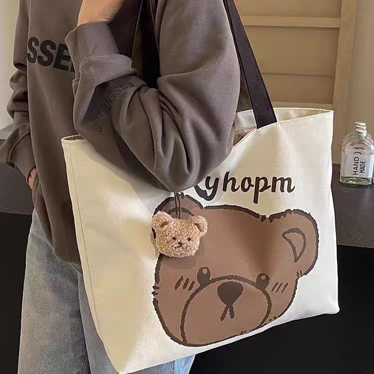 Bear motif bag interior compartment detail