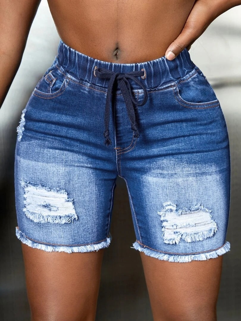 Dark Blue Ripped Fringe Skinny Jeans, angled product view