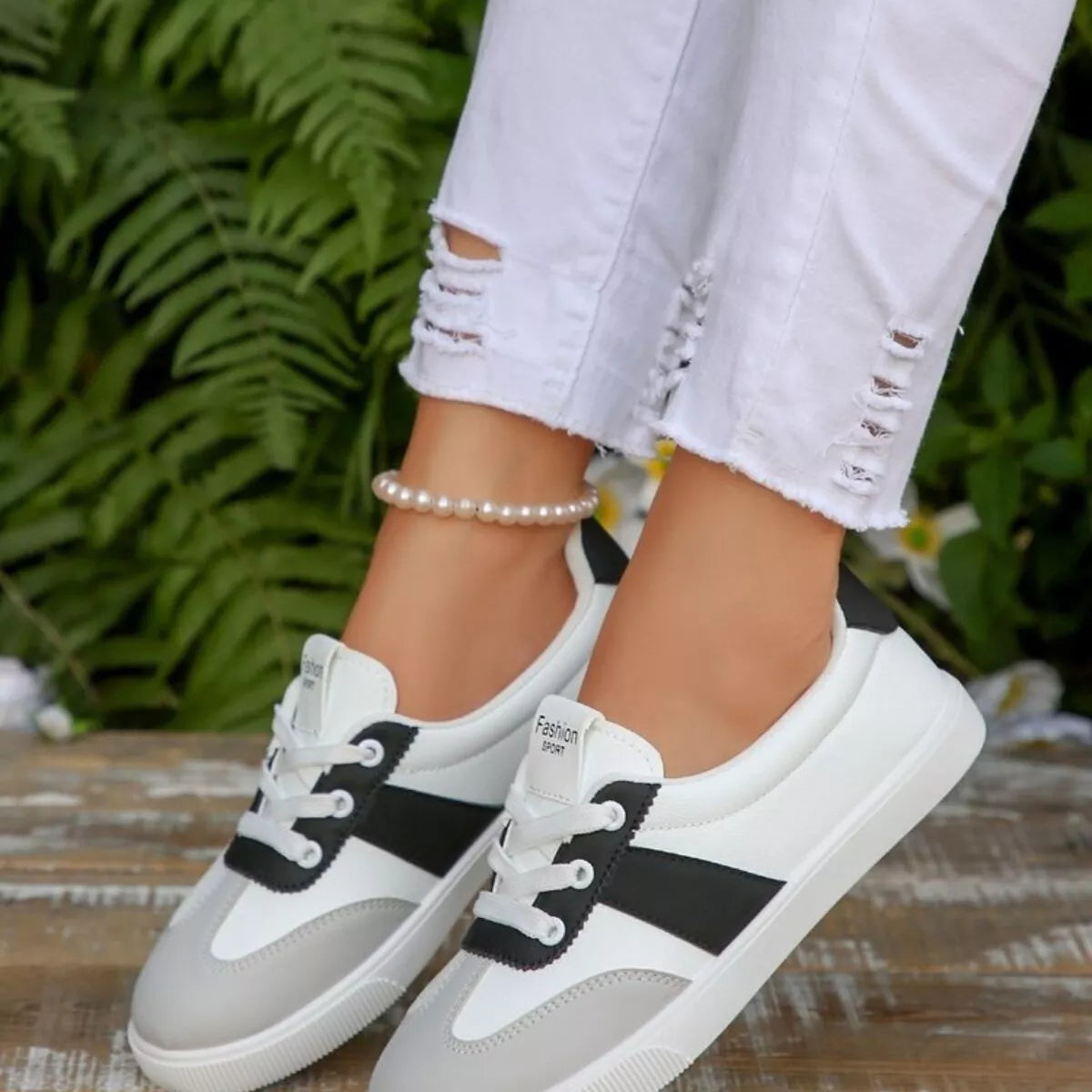 Round toe lace up sneakers in black and red — additional view 2