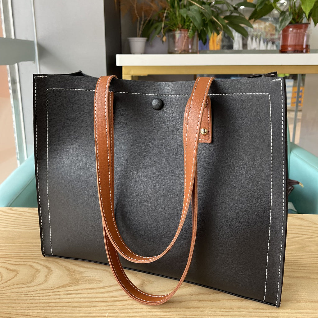 Embossed PU Tote Bag, shown in a clear product image