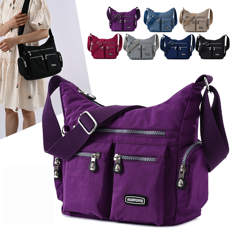 Water-Resistant Nylon Crossbody Bag for Women - Multi-Pocket Shoulder Bag, shown in a clear product image