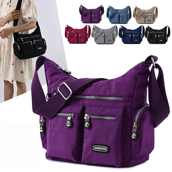Water-Resistant Nylon Crossbody Bag for Women - Multi-Pocket Shoulder Bag, shown in a clear product image