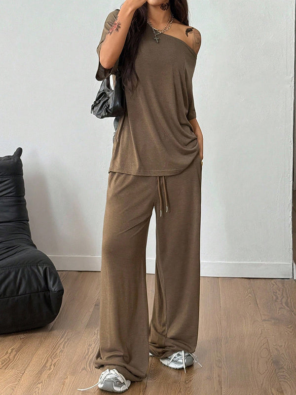 Casual two-piece blouse and trousers outfit view 12