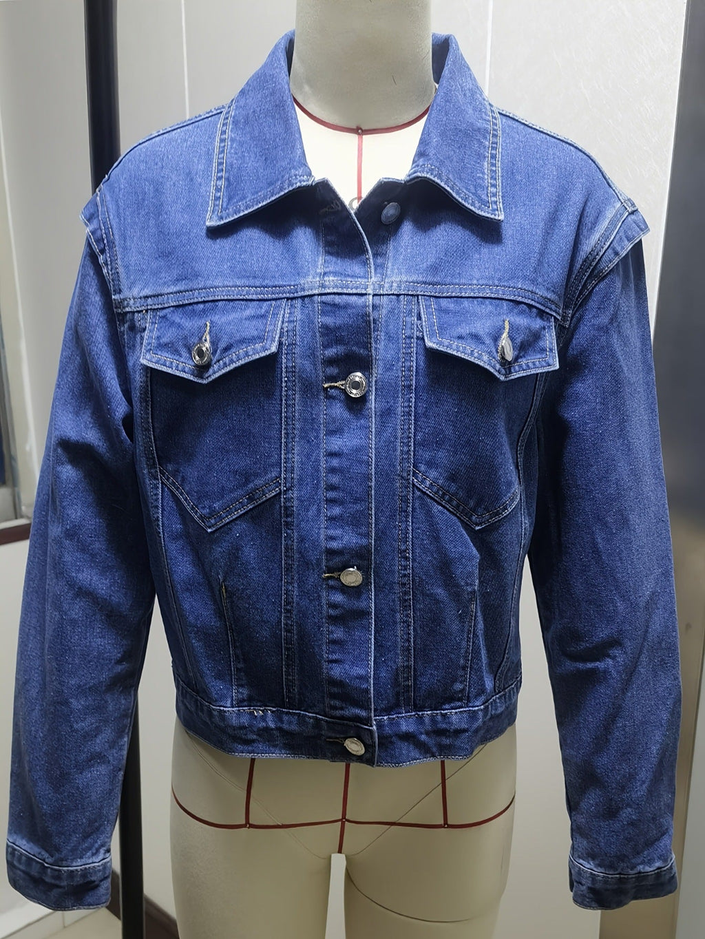 Washed denim jacket, back view