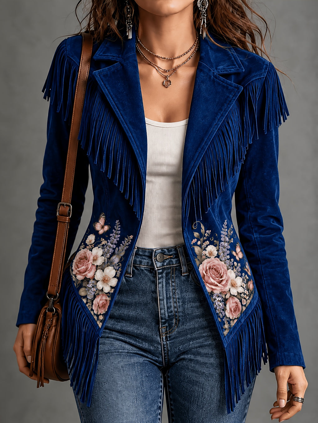 Navy blue women's jacket with floral details and fringe along the shoulders and hem