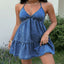 Model wearing the Halter Neck Denim Mini Dress