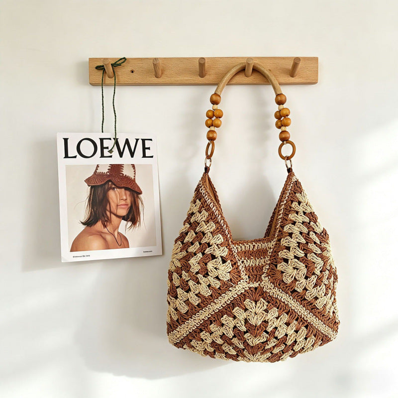 Shoulder bag shown from side angle