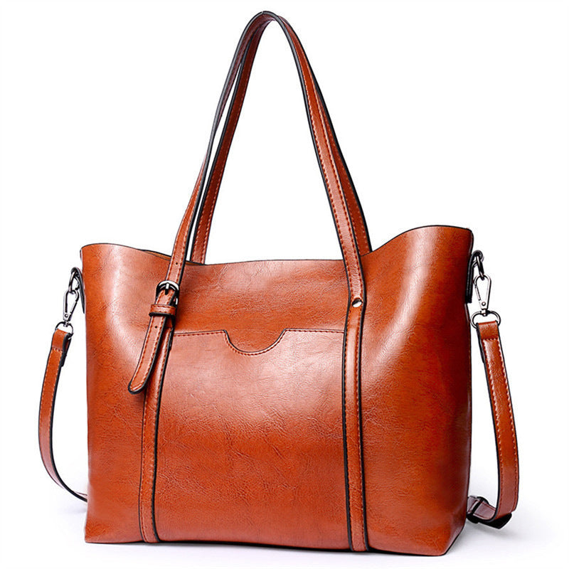 Retro tote bag phone compartment detail