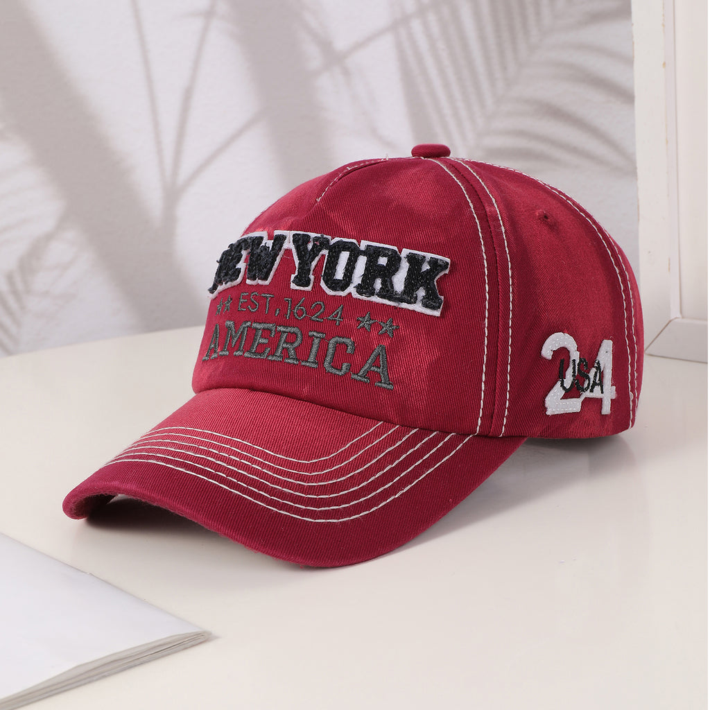 Red embroidered lettering baseball cap