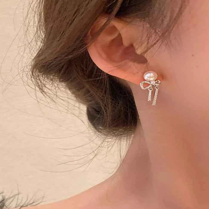 Pearl bowknot drop earrings — primary view