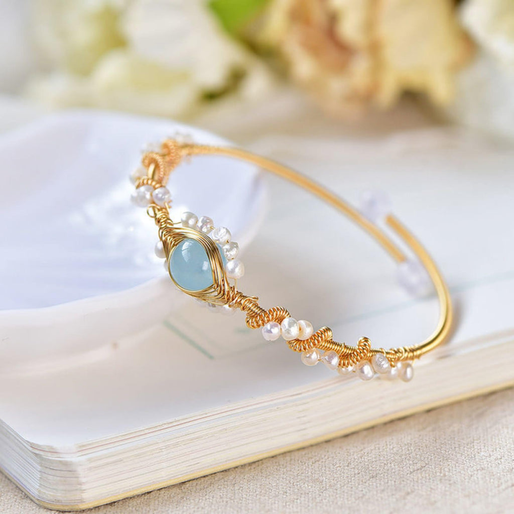 Product detail photo of Gold Tone Pearl Braided Bracelet, gold tone pearl braided bracelet
