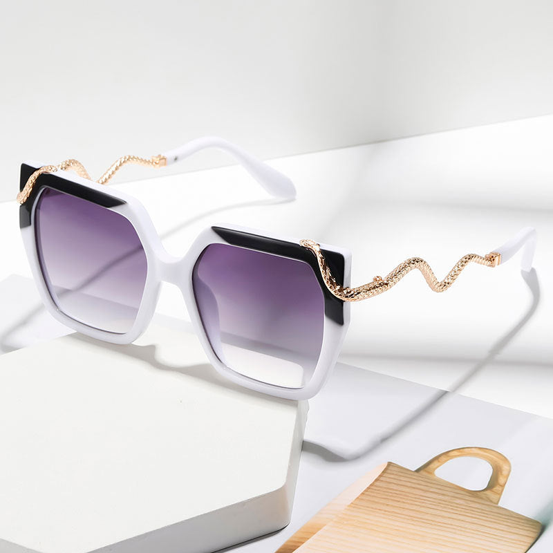 Statement cat-eye sunglasses styling
