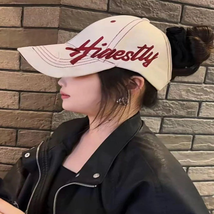 Embroidered baseball cap in off-white — primary view