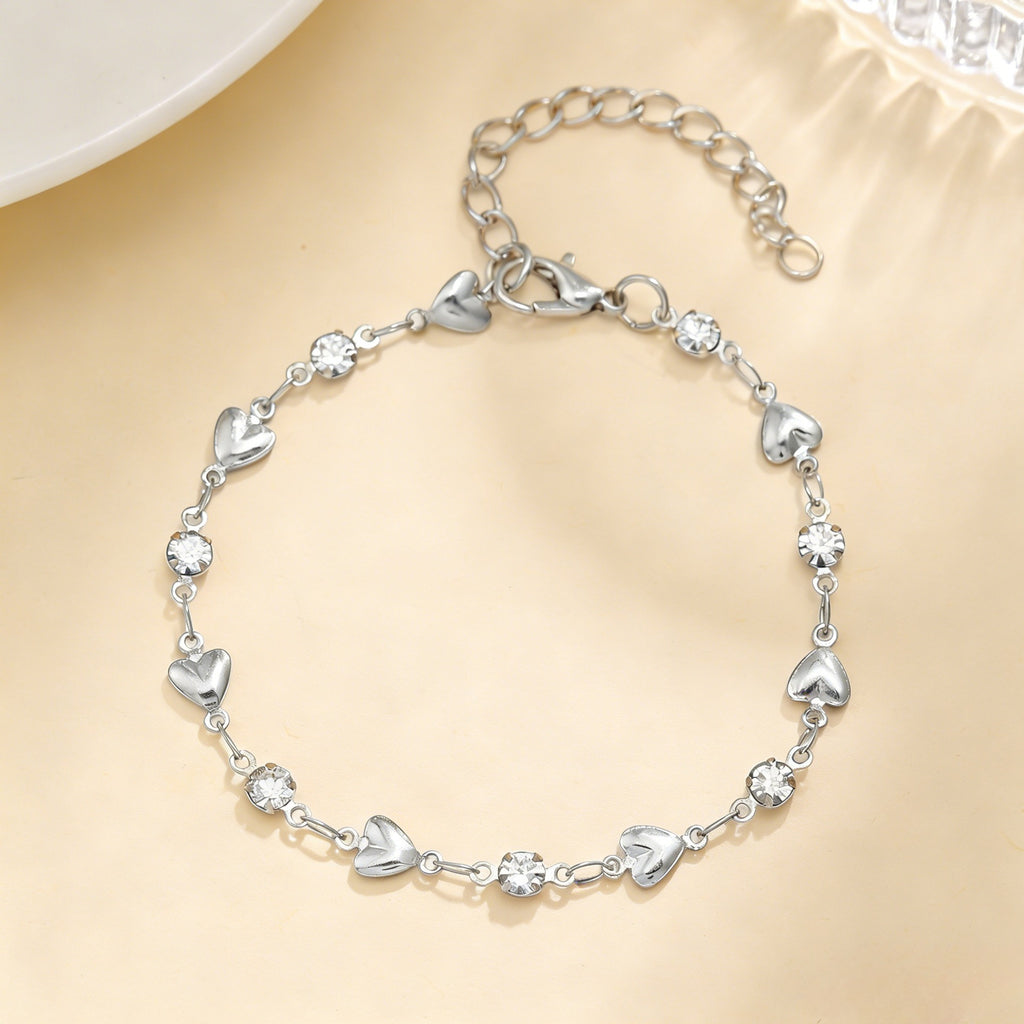 Hollow heart bracelet with cubic zirconia stones - view 2