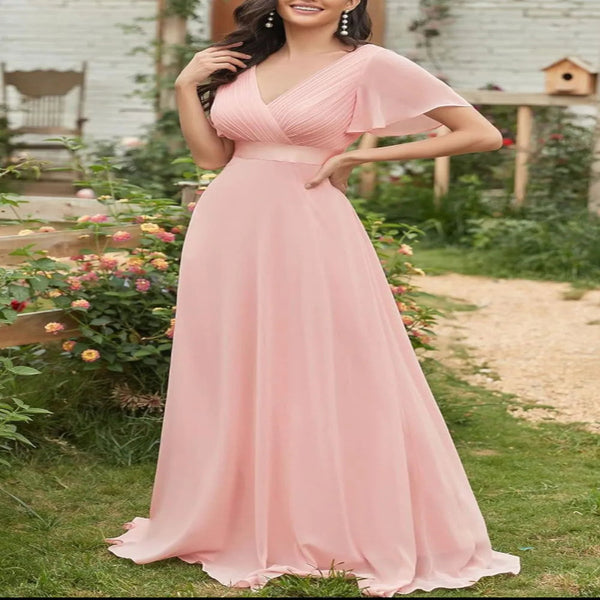 Model wearing the Surplice Flutter Sleeve Maxi Dress