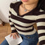Model wearing the Striped Ribbed Knit Long Sleeve Sweater