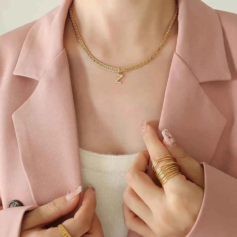 Letter pendant necklace in brass with zircon inlay — additional view 8