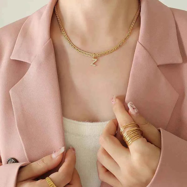 Letter pendant necklace in brass with zircon inlay — additional view 8