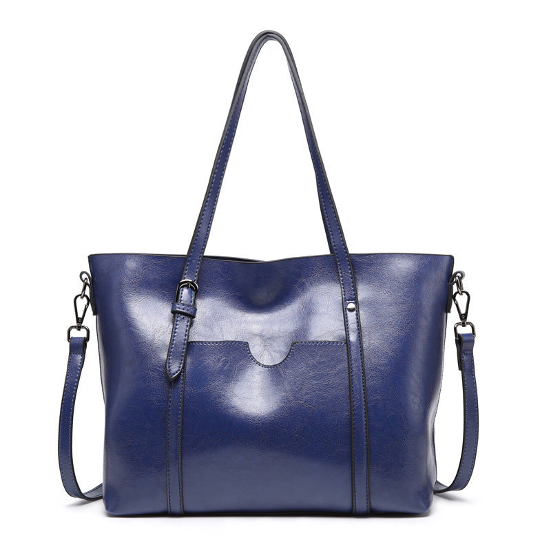 Retro tote bag shown carried on shoulder