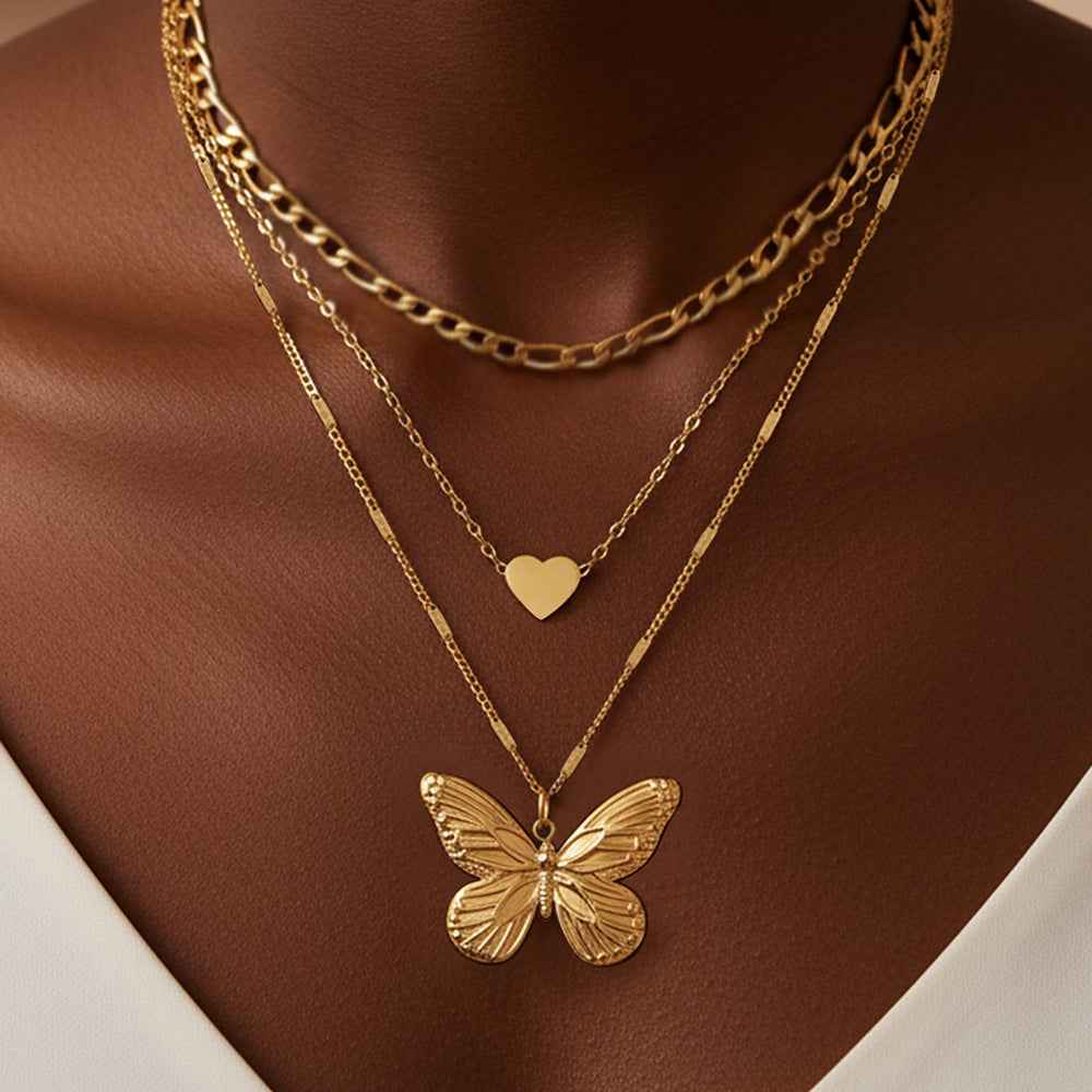 Three-tier butterfly and heart stacking necklace — primary view