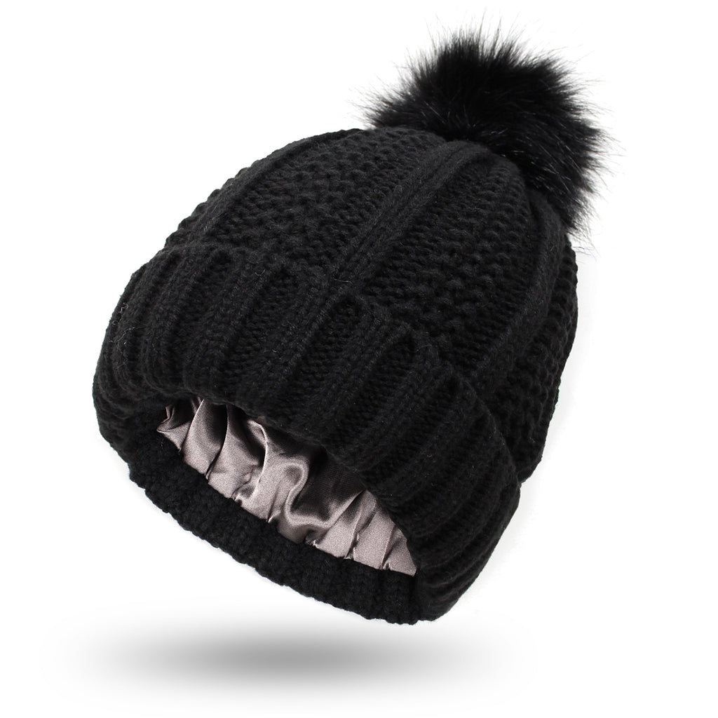 Black satin lined pom pom beanie hat for women