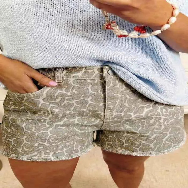 Raw edge leopard print denim shorts — primary view