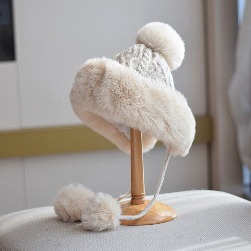 Beige pom-pom lace-up winter hat for women