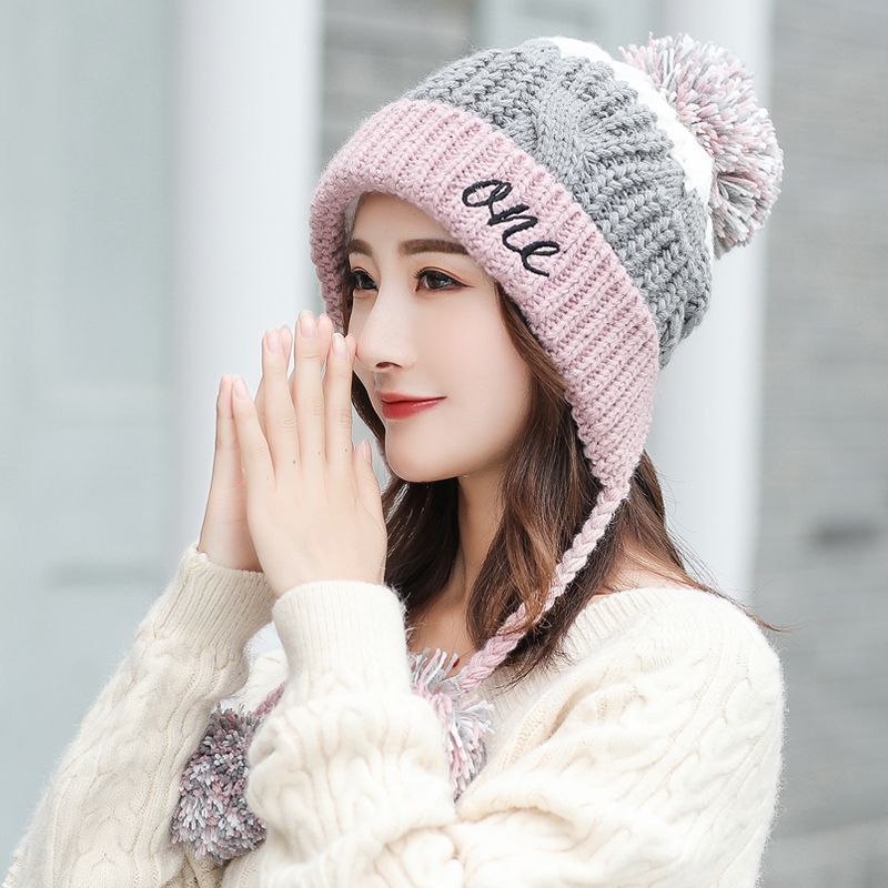 Pink fleece lined pom pom wool hat for women