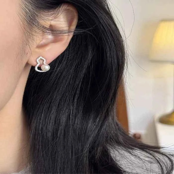 Pearl gourd stud earrings — primary view