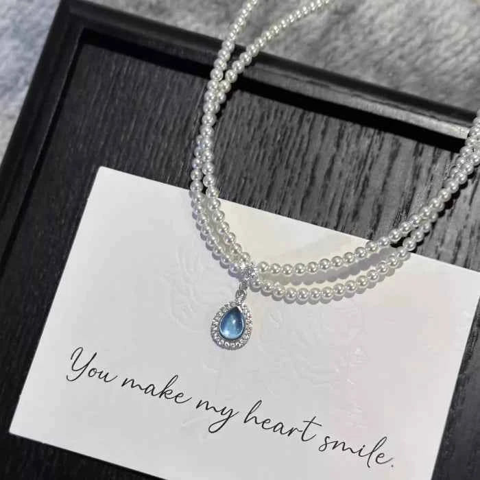Double layer pearl necklace with teardrop pendant — primary view