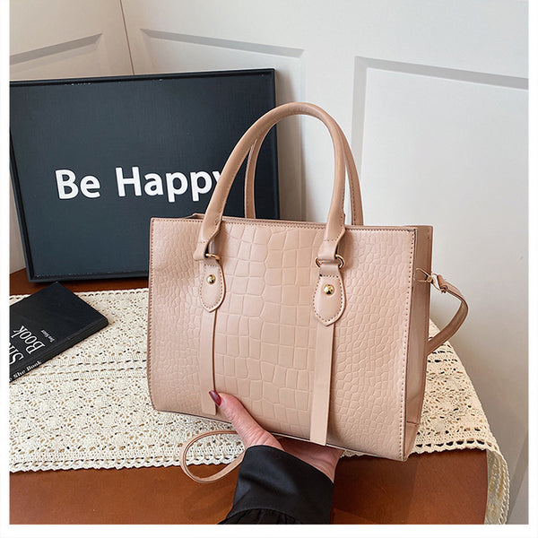 Shoulder tote bag shown carried on shoulder