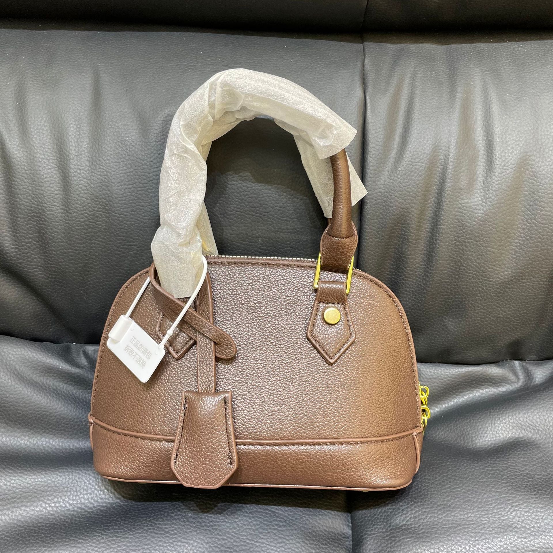 Shell crossbody bag chain strap detail