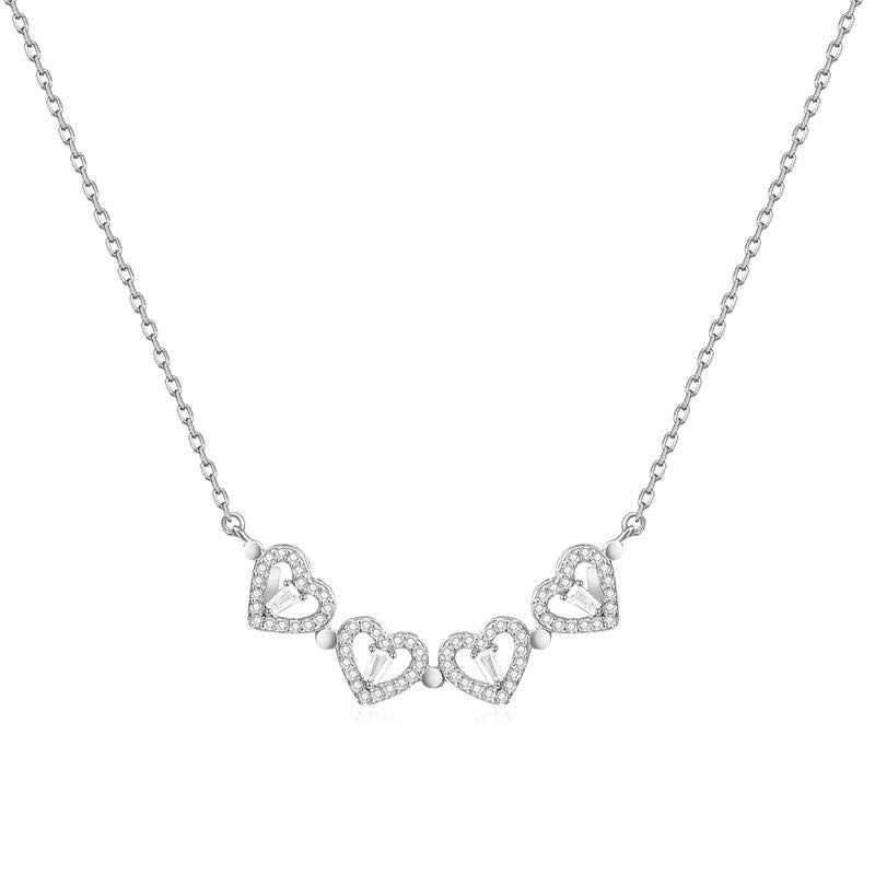 Four-leaf clover and heart necklace — primary view