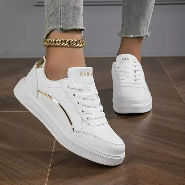 Round toe lace up sneakers in gold and white — primary view