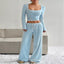 Model wearing the Striped Long Sleeve Crop Top & Wide Leg Pants Set