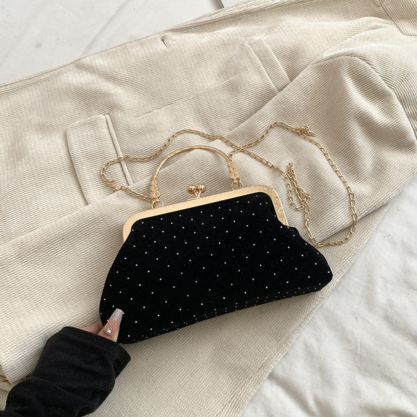 Shell crossbody bag zipper closure detail