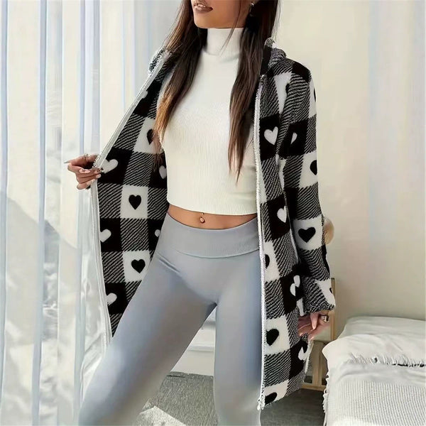 Black and cream heart-patterned hooded long jacket, worn open by a model