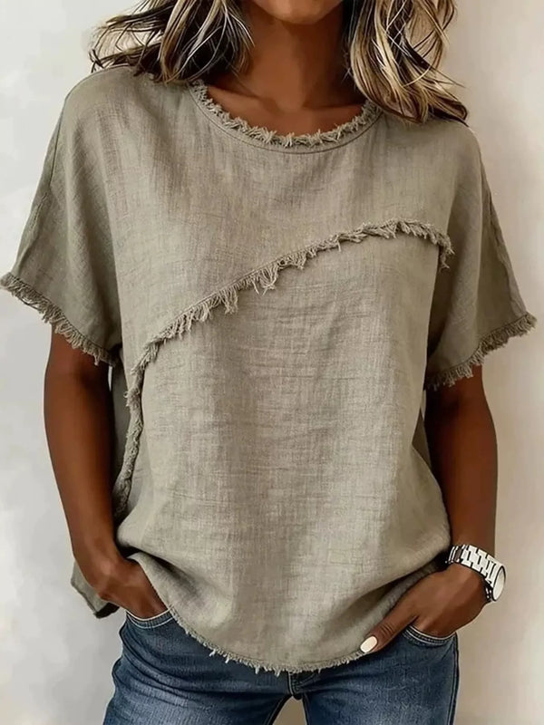 Model wearing the Full Size Frayed Hem Short Sleeve Top Plus Size