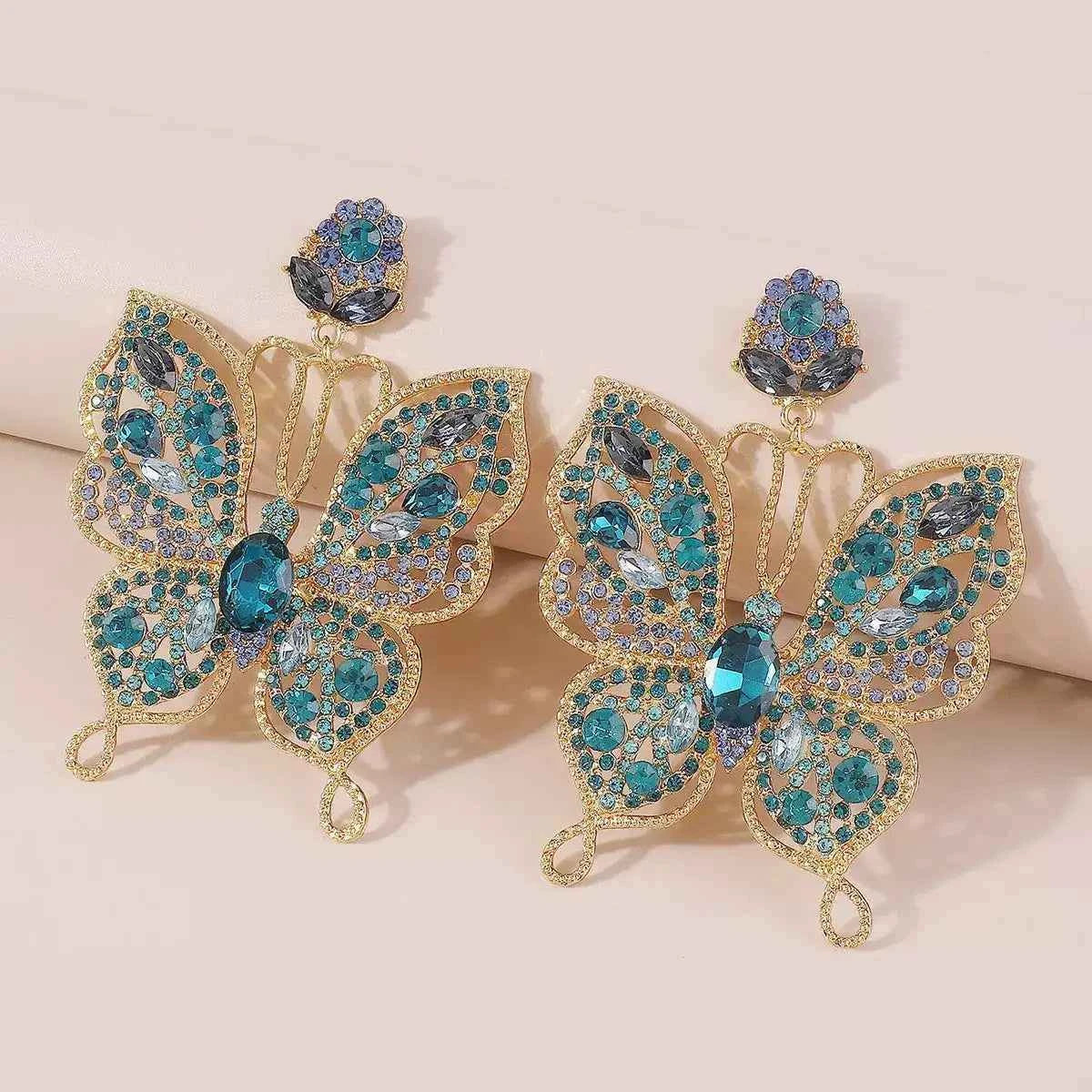 Butterfly rhinestone earrings in 18K gold-plated finish — additional view 3