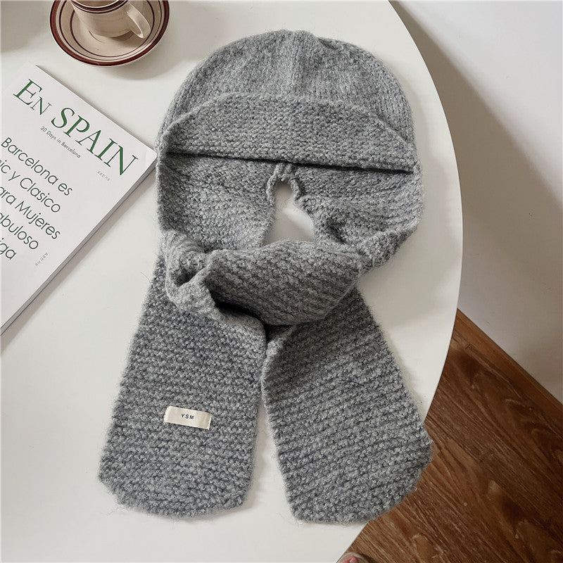 Grey solid color knitted beanie hat for women