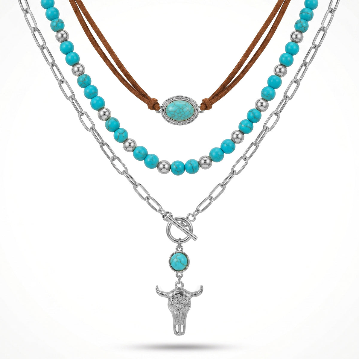 Layered necklace with turquoise-colored beads, brown cord and a silver-tone bull head pendant