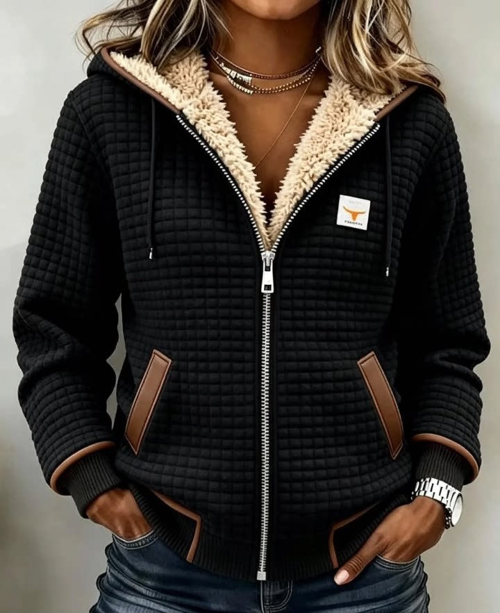 Black waffle-textured zip-up hoodie with plush lining and brown pocket trim