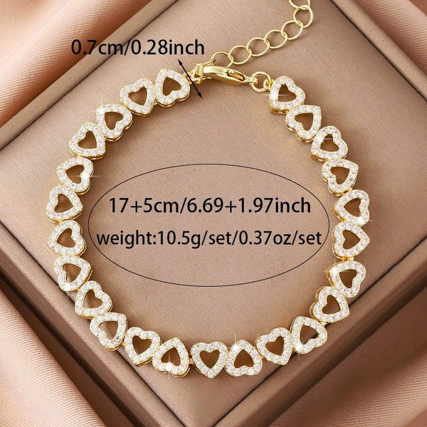 Heart charm bracelet layered with other jewelry - view 6