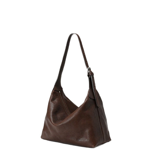 Hobo bag shown carried on shoulder