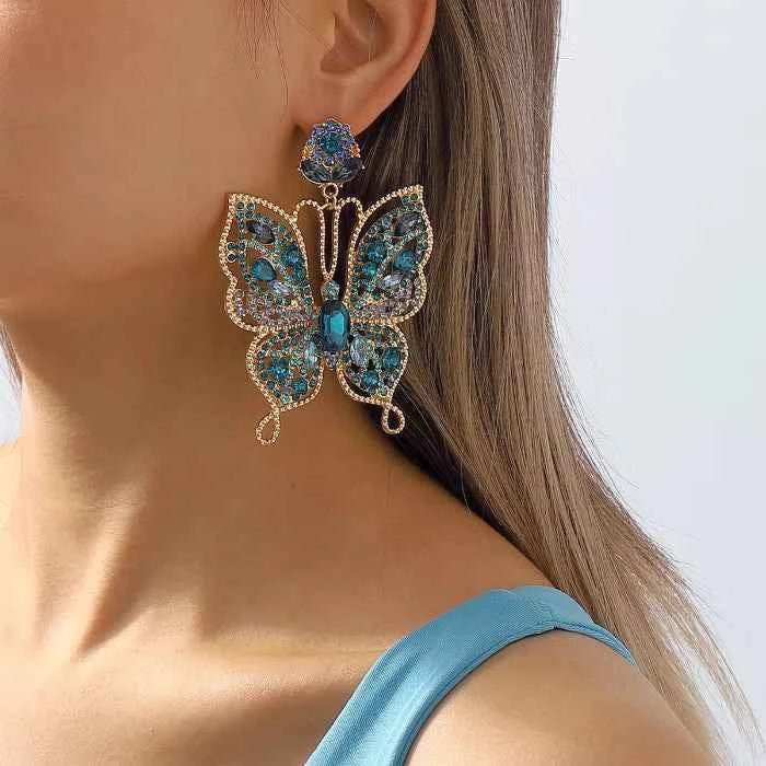 Butterfly rhinestone earrings in 18K gold-plated finish — primary view