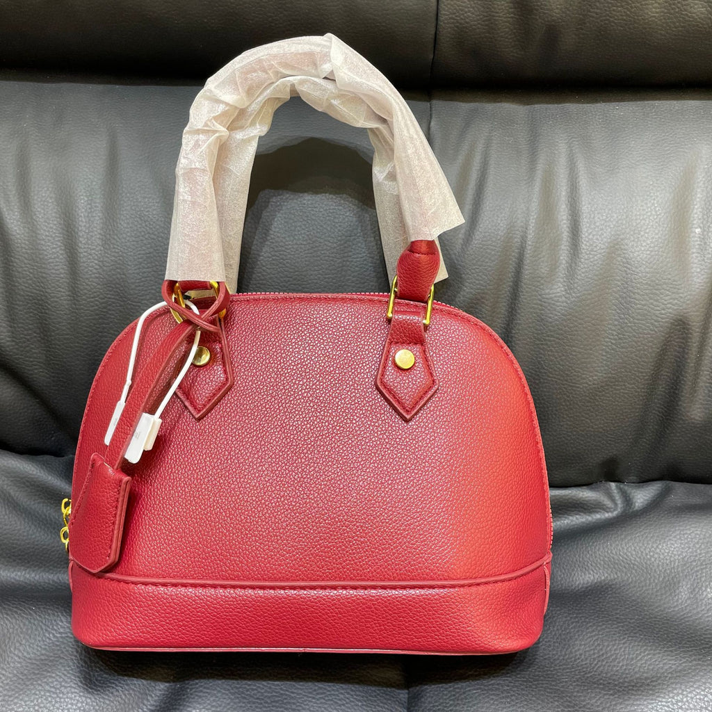 Shell crossbody bag structured shape close-up
