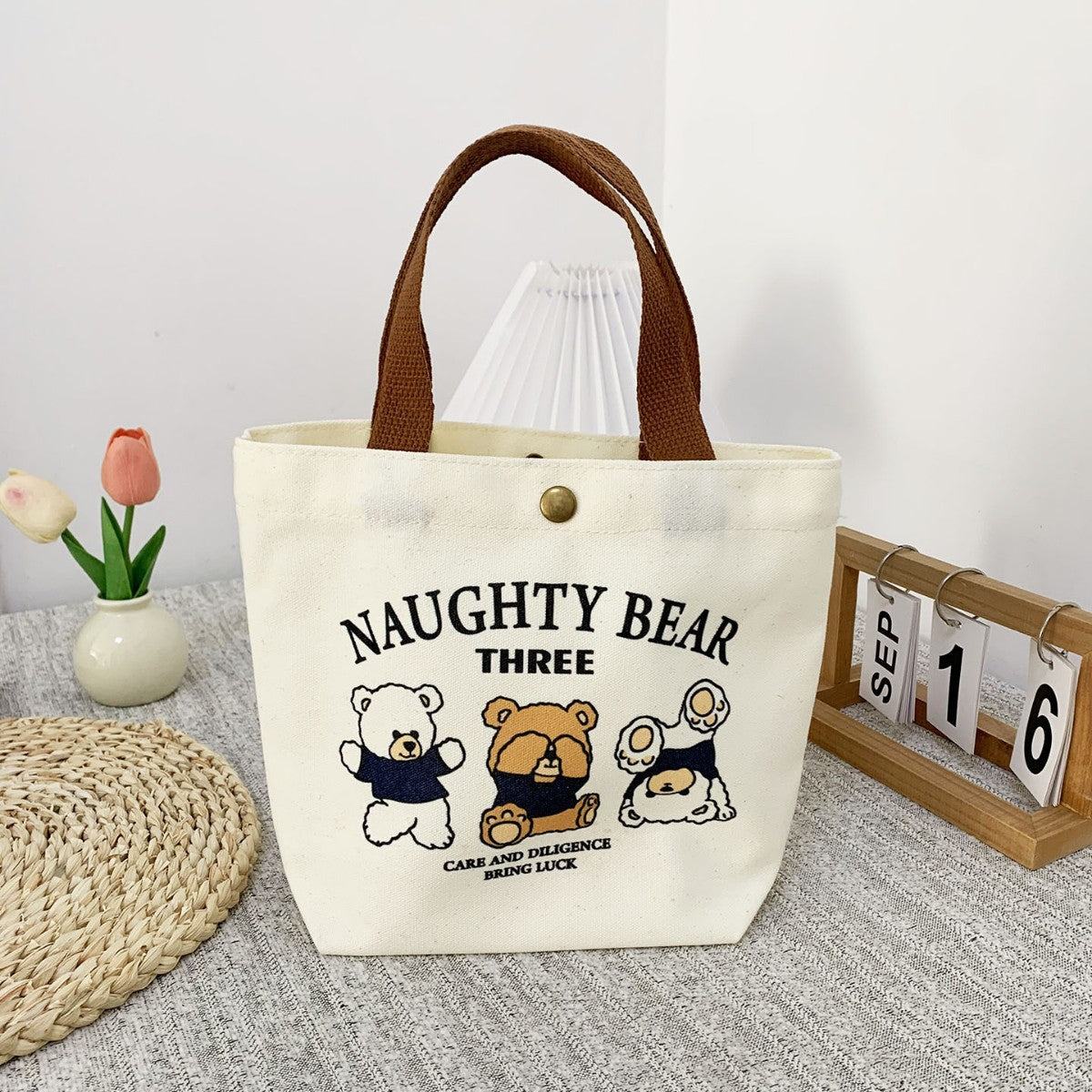 Canvas storage bag shown in dorm room setting