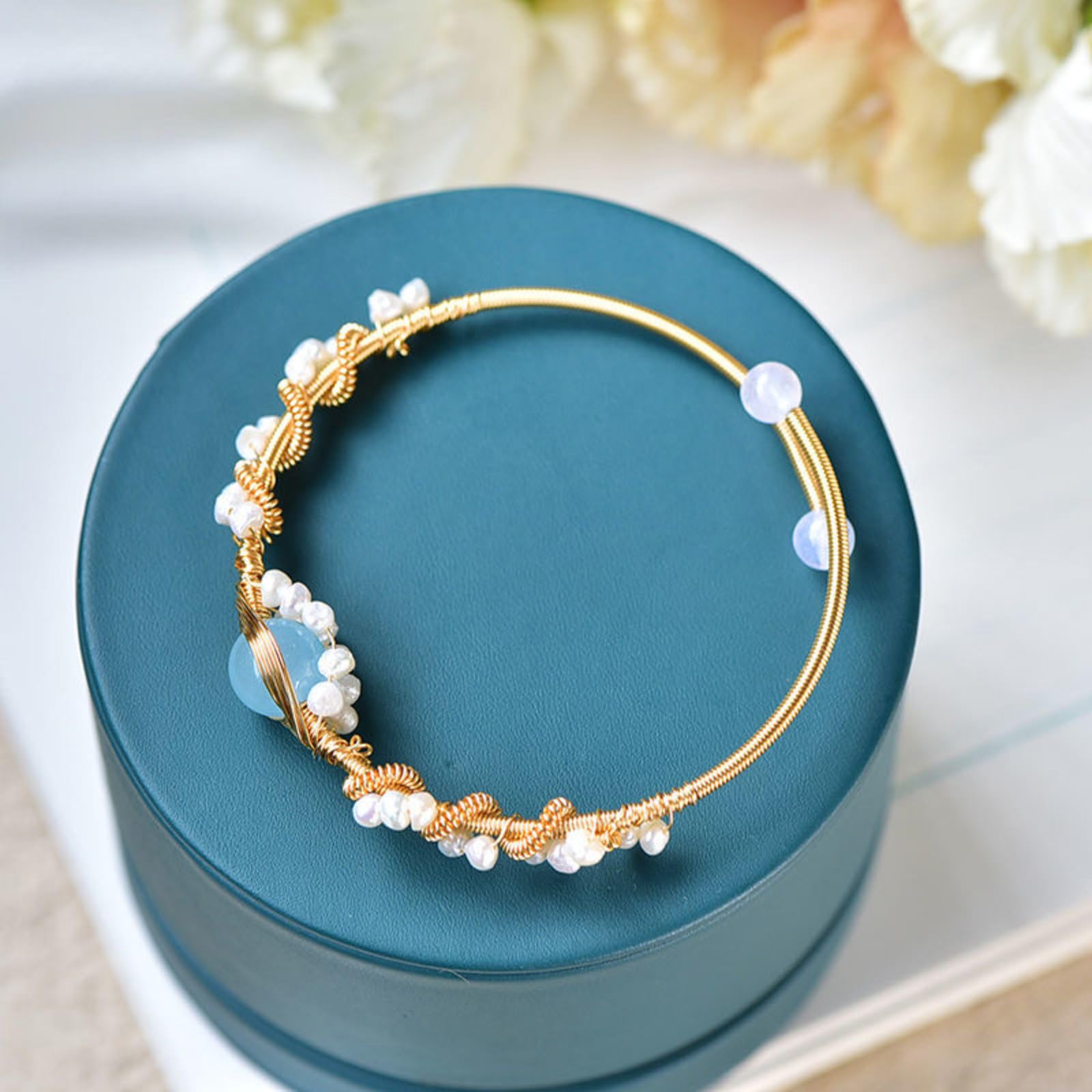 Product detail photo of Gold Tone Pearl Braided Bracelet, gold tone pearl braided bracelet