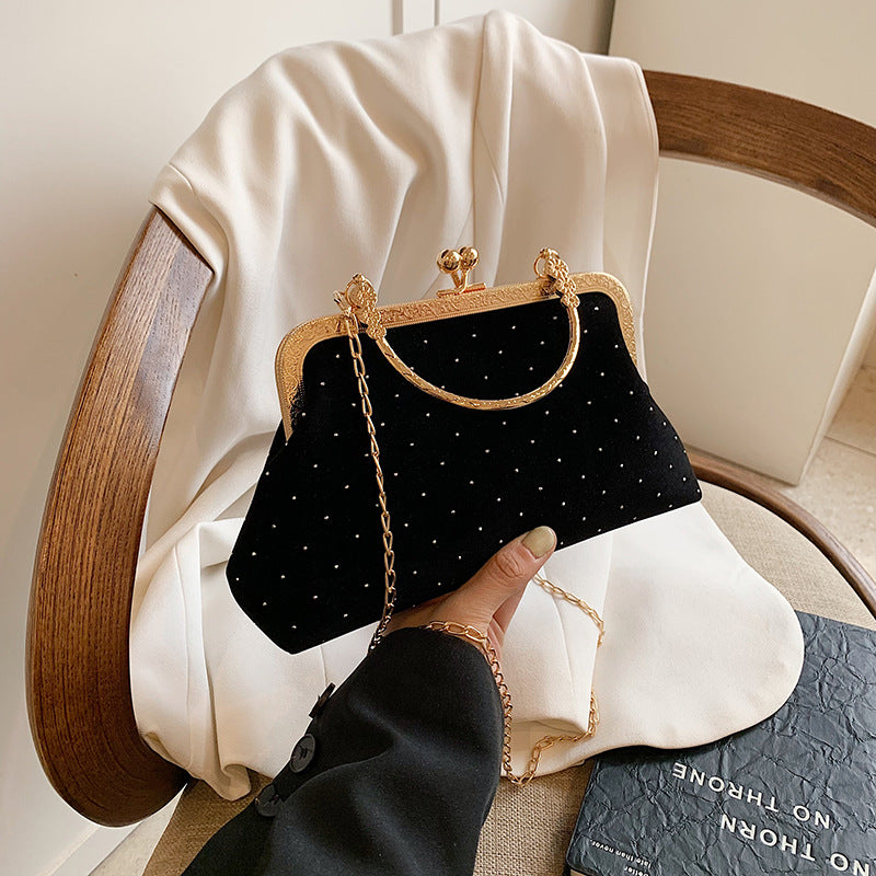 Shell crossbody bag chain strap detail