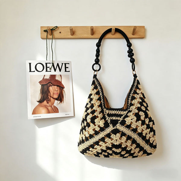 Shoulder bag shown carried on shoulder